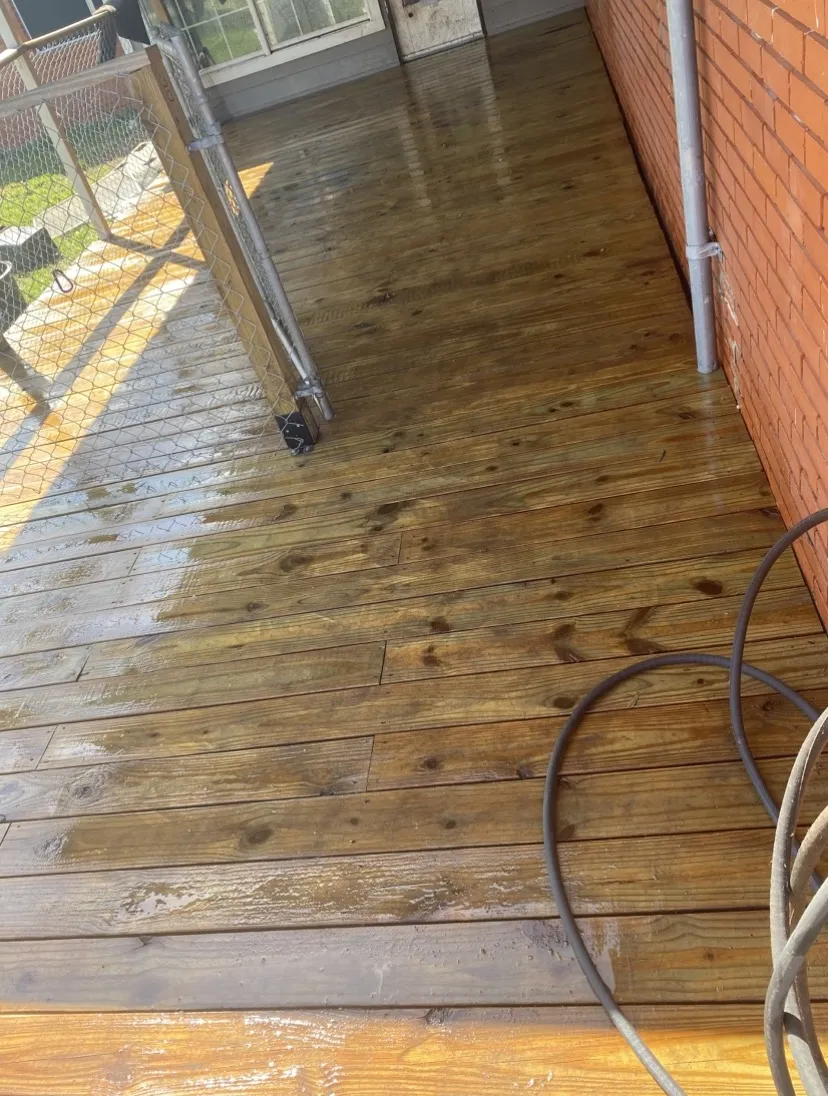 Wood deck cleaned and brightened